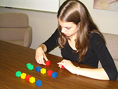 student with manipulatives