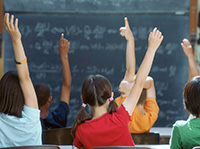 Students with their hands up