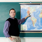 Teacher discussing a map