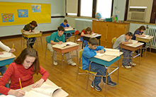 Students reading in a classroom