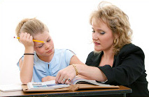 Teacher assisting a student