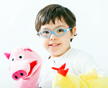 young boy with puppet