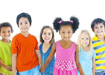 group of children standing and holding hands