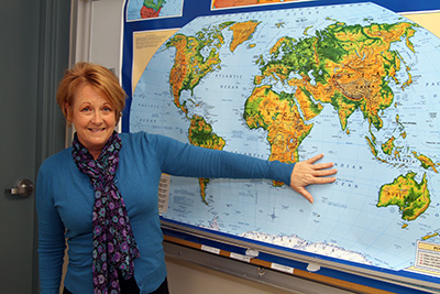Teacher pointing to map